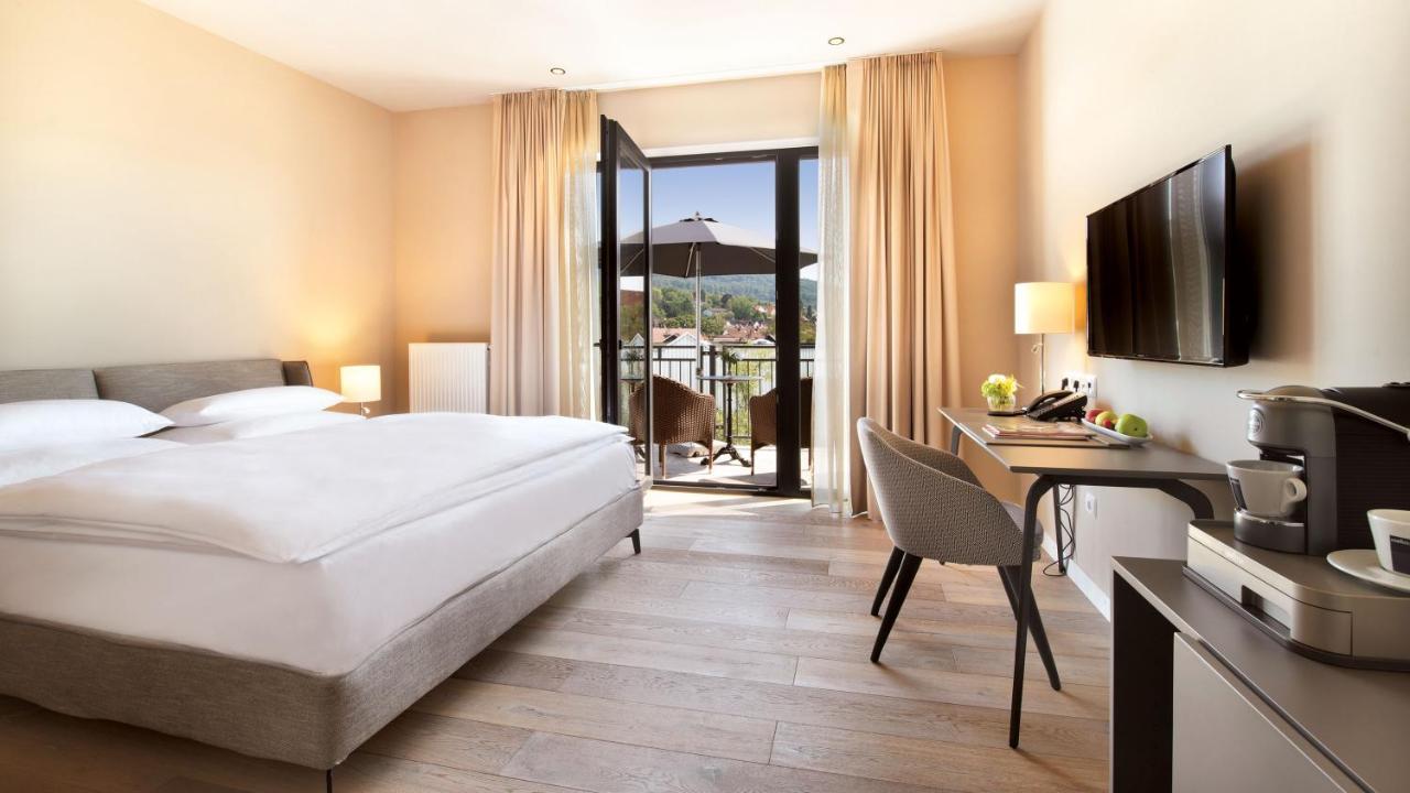 Deluxe Doppelzimmer mit Balkon zum Garten